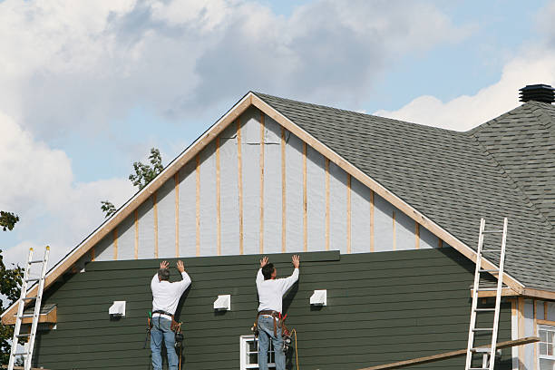 Professional Emergency Siding Repair technician working in Campbell, OH